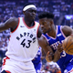 Jimmy Butler of the Philadelphia 76ers, right, dribbles the ball as Pascal Siakam of the Toronto Raptors defends during Game One of the second round of the 2019 NBA Playoffs at Scotiabank Arena on April 27, 2019 in Toronto, Canada.